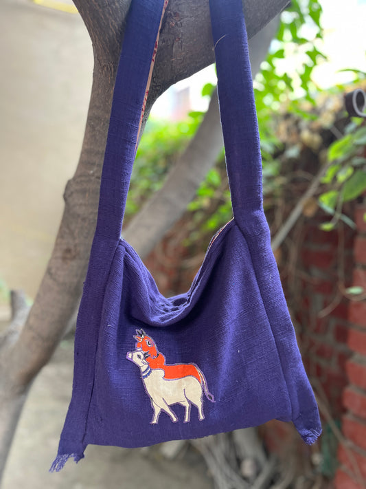 Handcrafted Purple Khadi Sling Bag with Folk Cow Motif Embroidery