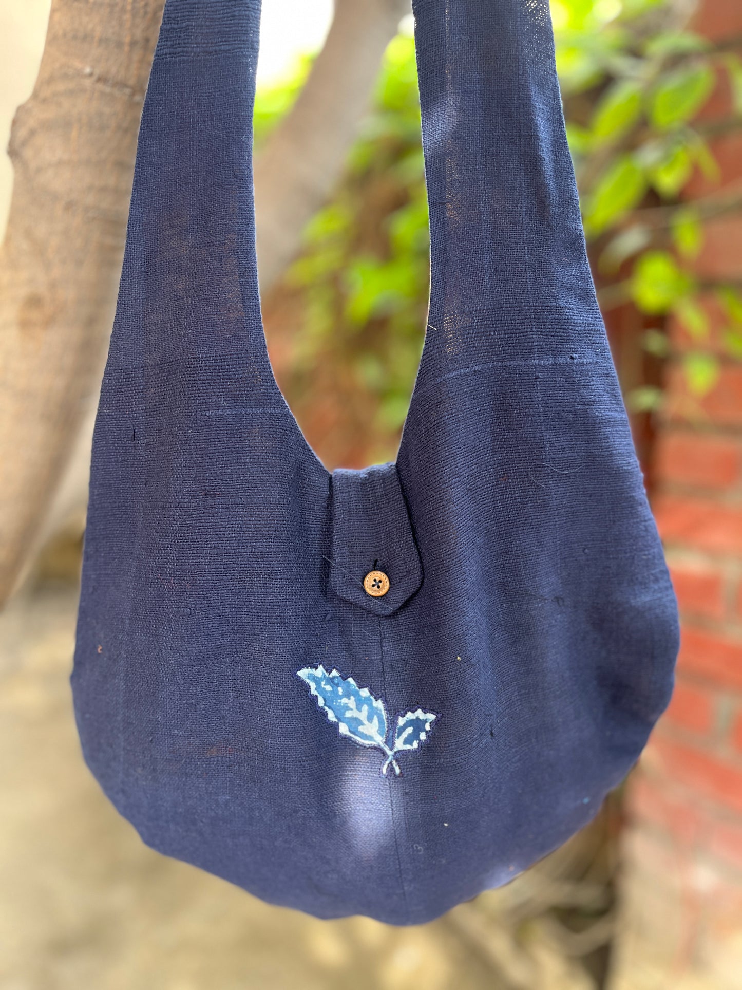 Handcrafted Navy Blue Khadi Sling Bag with Leaf Motif Embroidery