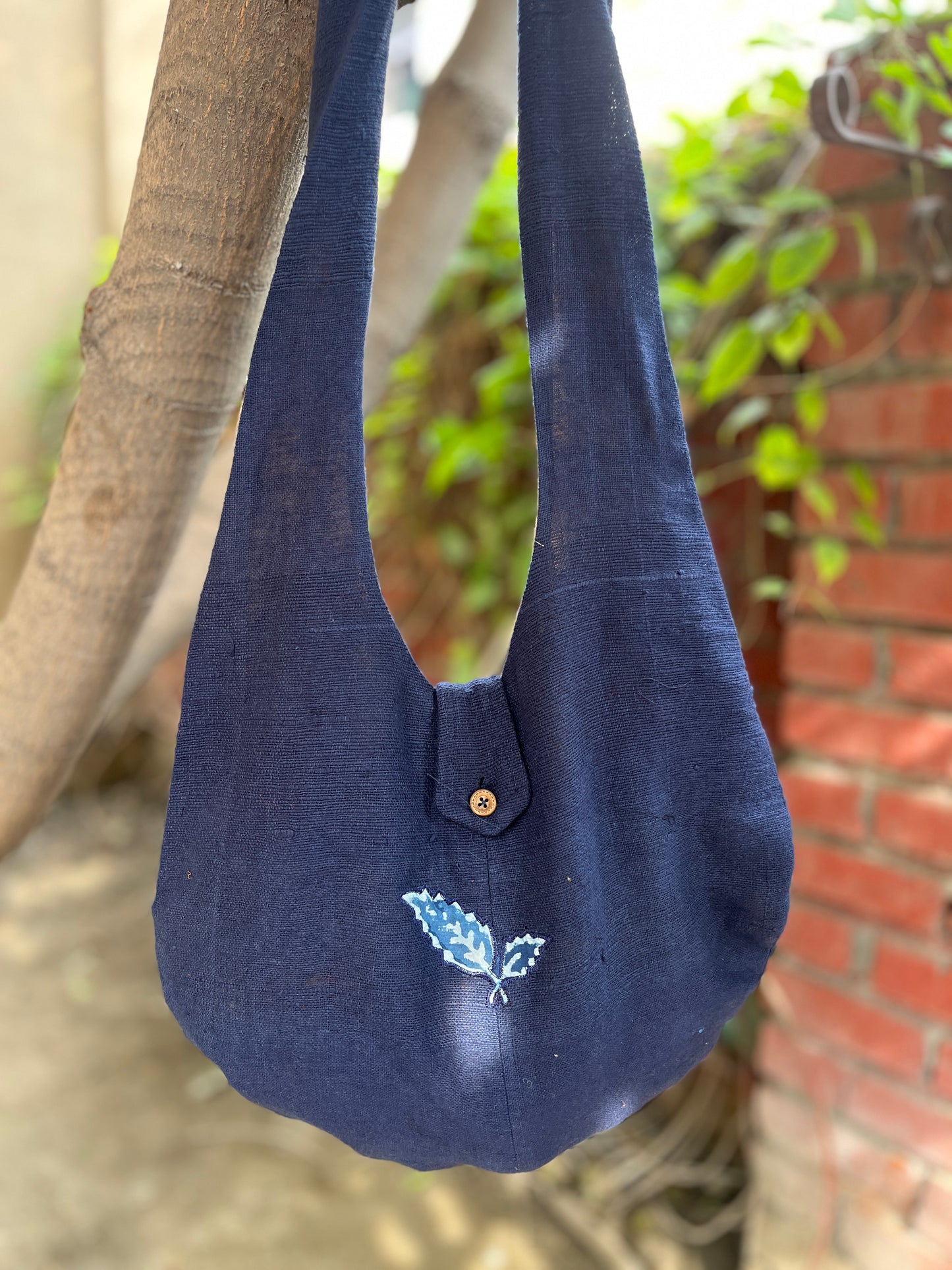 Handcrafted Navy Blue Khadi Sling Bag with Leaf Motif Embroidery