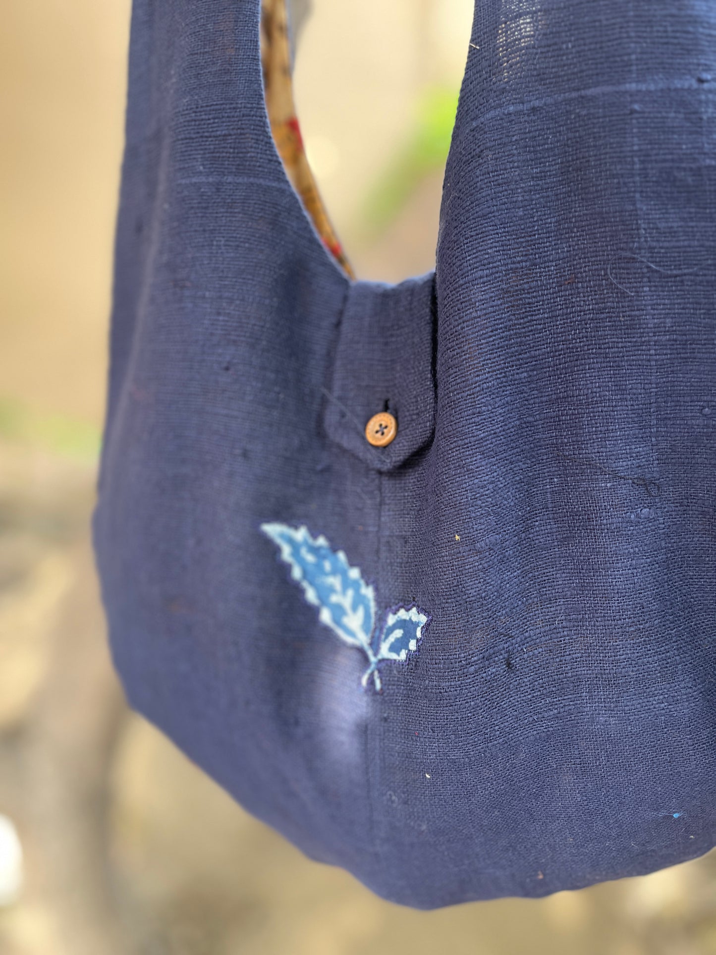 Handcrafted Navy Blue Khadi Sling Bag with Leaf Motif Embroidery