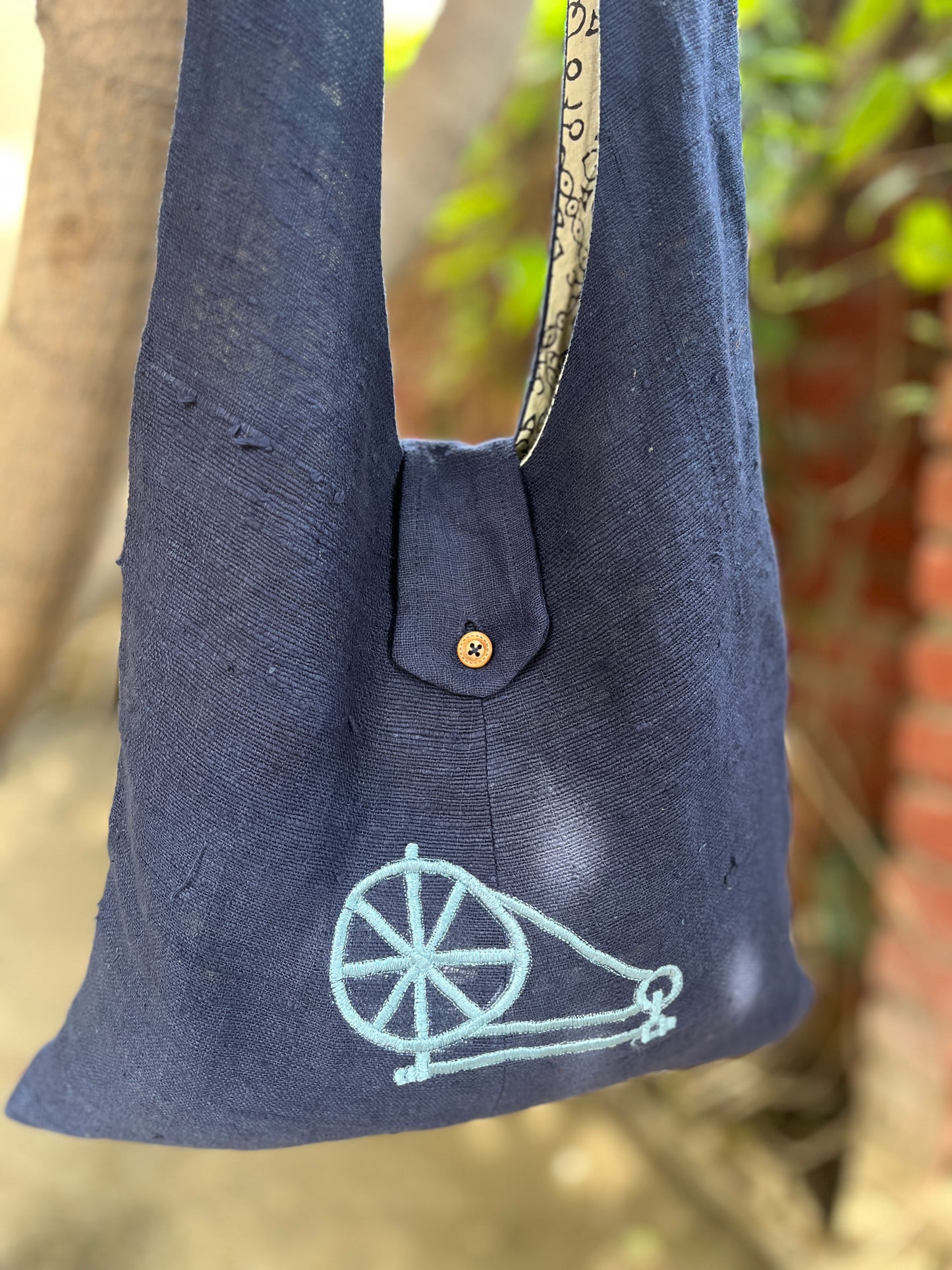 Handcrafted Navy Blue Khadi Sling Bag with Charkha Embroidery