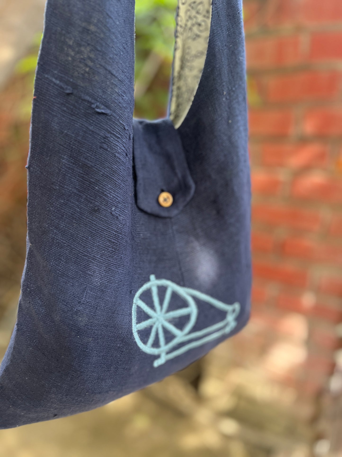 Handcrafted Navy Blue Khadi Sling Bag with Charkha Embroidery