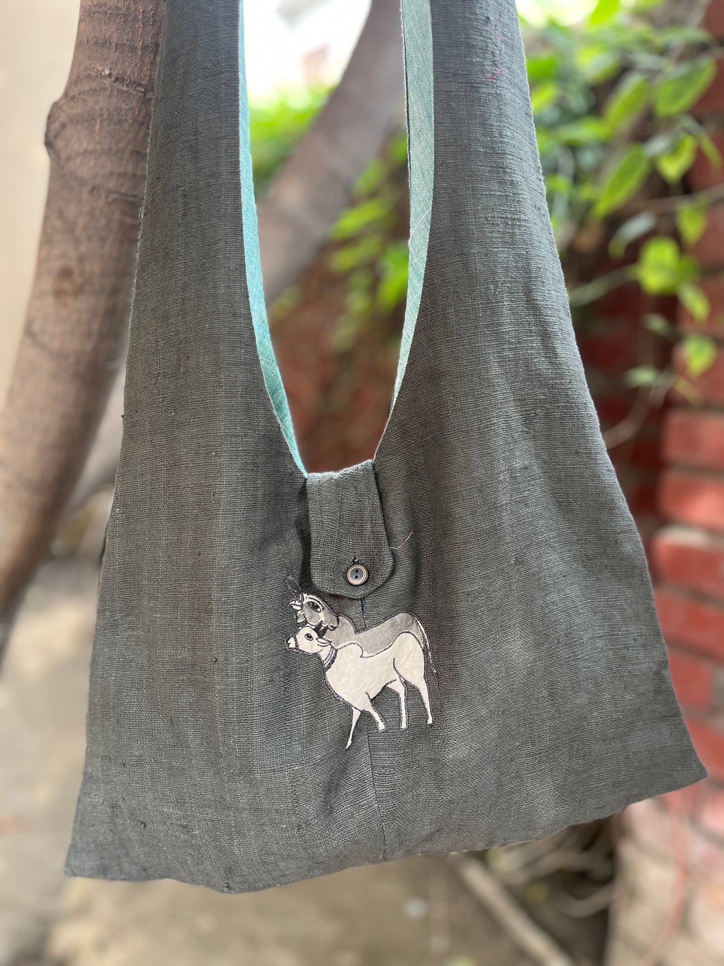 Handcrafted Grey Khadi Sling Bag with Double Cow Motif Embroidery
